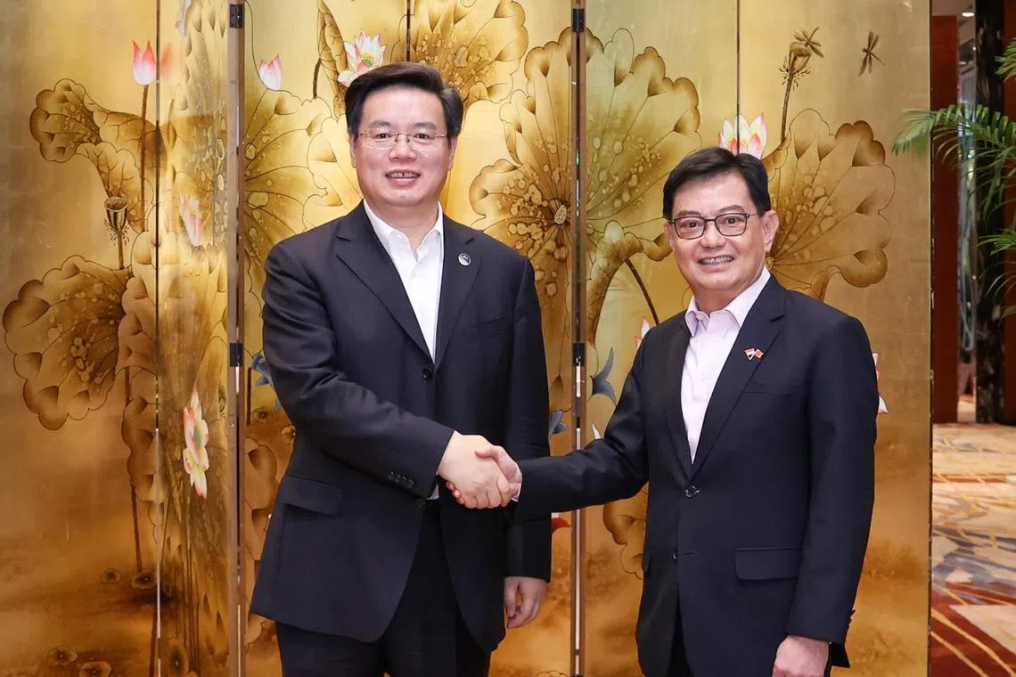 DPM Heng Swee Keat (right) meeting Shenzhen mayor Qin Weizhong on April 12.