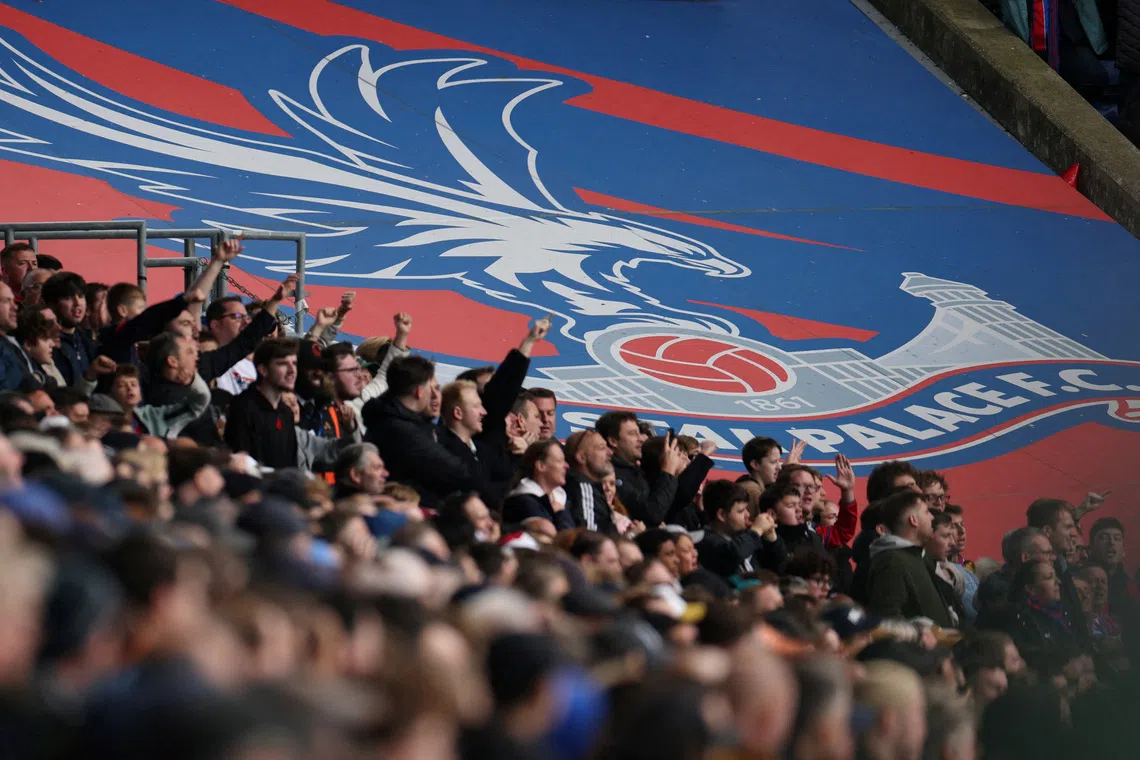 FILE PHOTO: Soccer Football - Premier League - Crystal Palace v Brighton & Hove Albion - Selhurst Park, London, Britain - November 9, 2025  General view of a giant Crystal Palace banner and Crystal Palace fans during the match REUTERS/Isabel Infantes