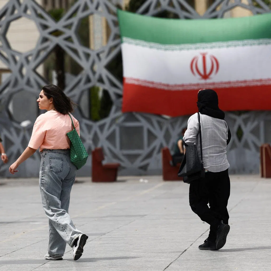 Iranian women walk on a street, amid a ceasefire between U.S. and Iran, in Tehran, Iran, April 27, 2026. Majid Asgaripour/WANA (West Asia News Agency) via REUTERS/File Photo