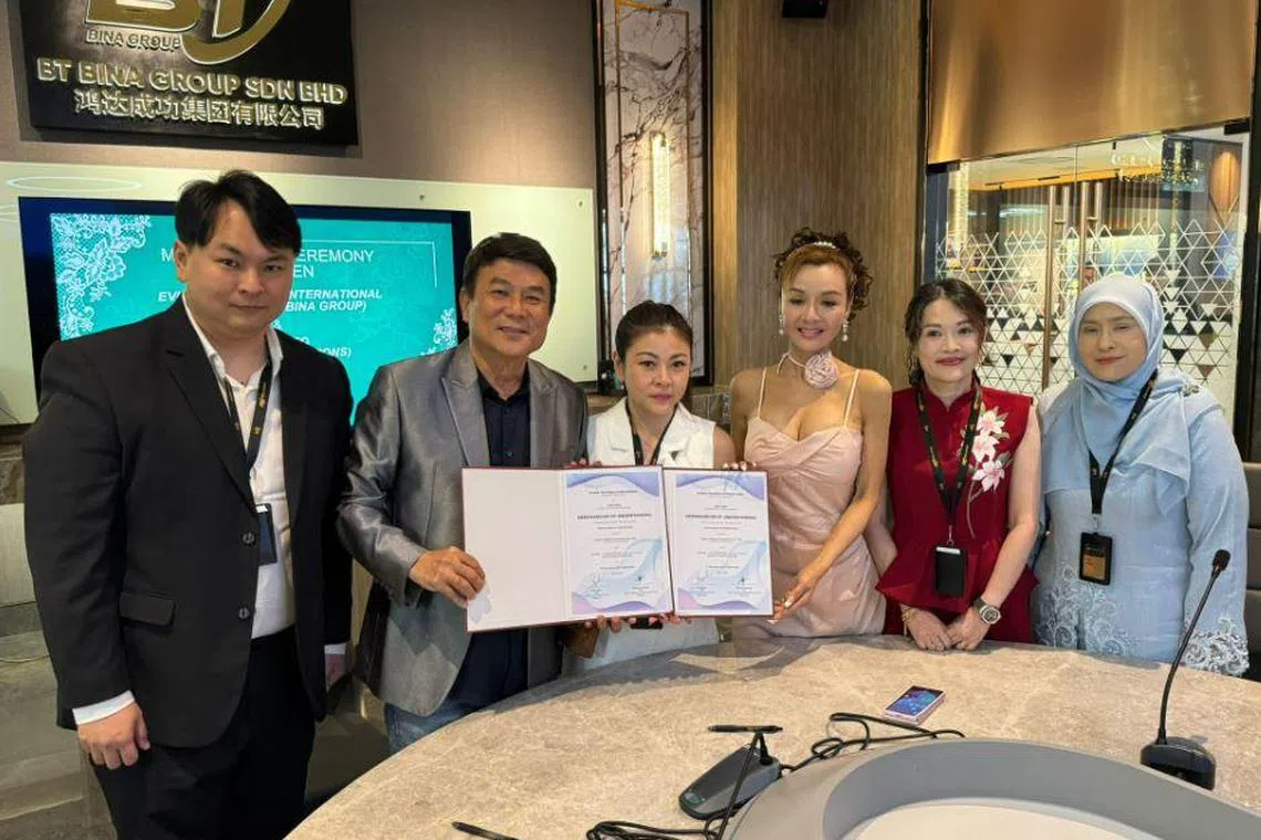 Former Hong Kong actress Amy Yip (third from right) and Singaporean director Jack Neo (second from left) will work together to launch a durian-themed hotel in Penang