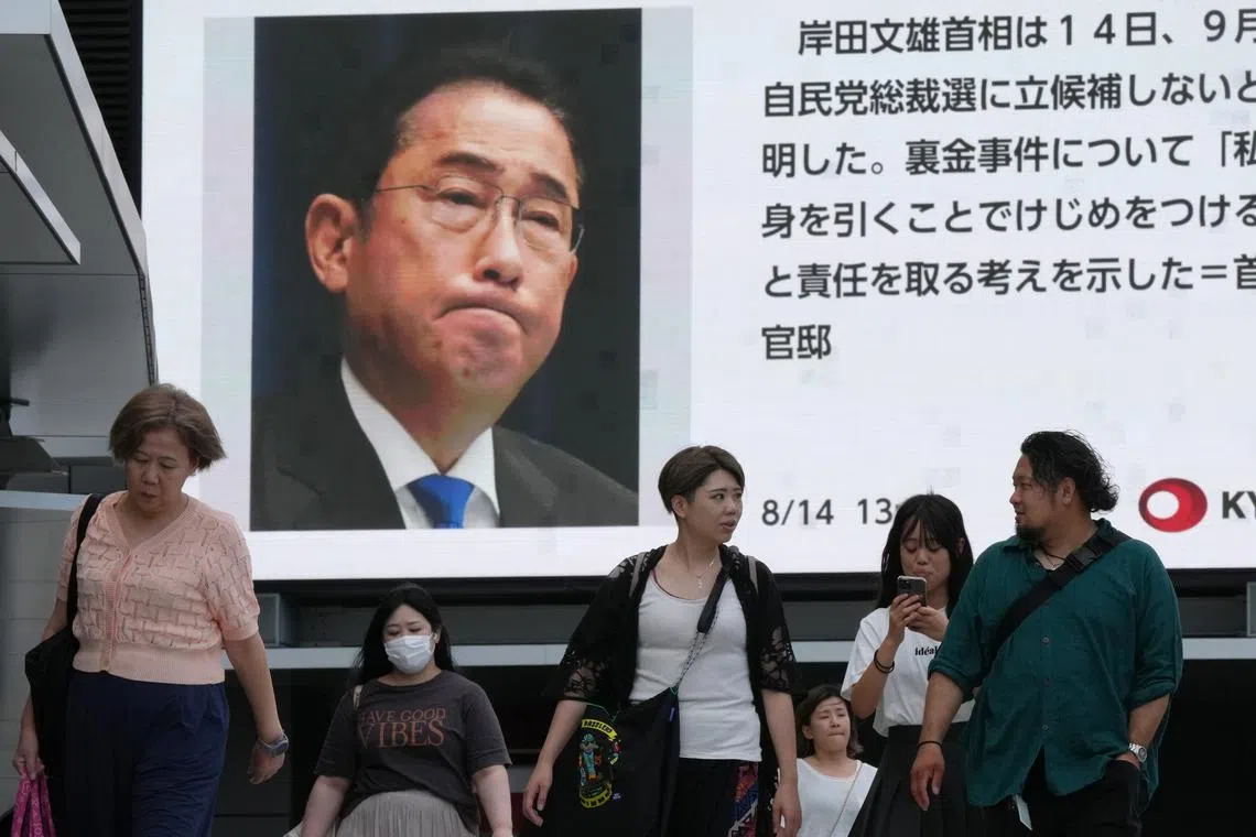 News of Japanese Prime Minister Fumio Kishida's resignation being broadcast in Tokyo on Aug 14.
