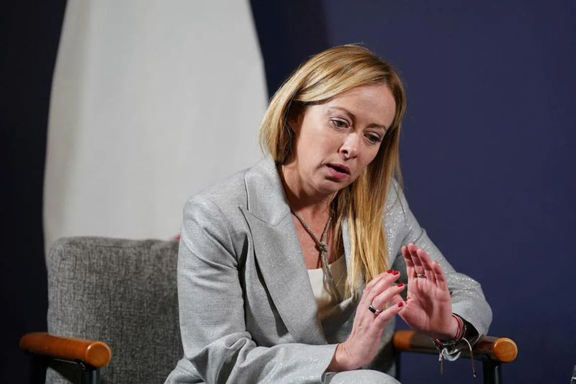 FILE PHOTO: Italy's Prime Minister Giorgia Meloni attends the UK Artificial Intelligence (AI) Safety Summit at Bletchley Park in Milton Keynes, Buckinghamshire, Britain November 2, 2023.  Joe Giddens/Pool via REUTERS/File Photo