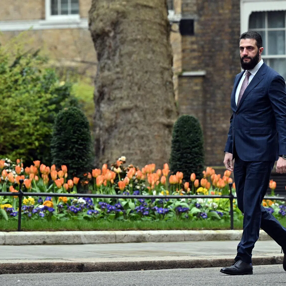 FILE PHOTO: Syria's President Ahmed al-Sharaa arrives ahead of a meeting with Britain's Prime Minister Keir Starmer at 10 Downing Street in central London, Britain, March 31, 2026.     JUSTIN TALLIS/Pool via REUTERS