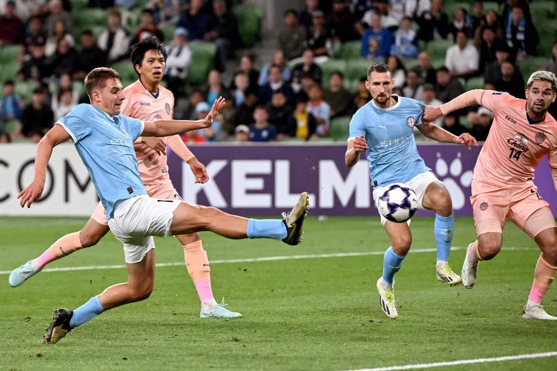 Melbourne City forward Max Caputo scores the winning goal in the AFC Champions League football match against Thailand's Buriram United at the Melbourne Rectangular Stadium on Oct 21, 2025.