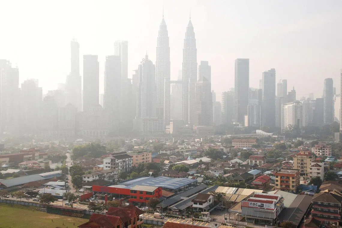 Kuala Lumpur's skyline shrouded by haze on Oct 3, 2023.