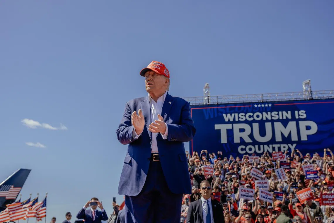 Former president Donald Trump, the Republican presidential nominee, addresses supporters at the Central Wisconsin Airport, in Mosinee, Wisconsin, on Sept 7.