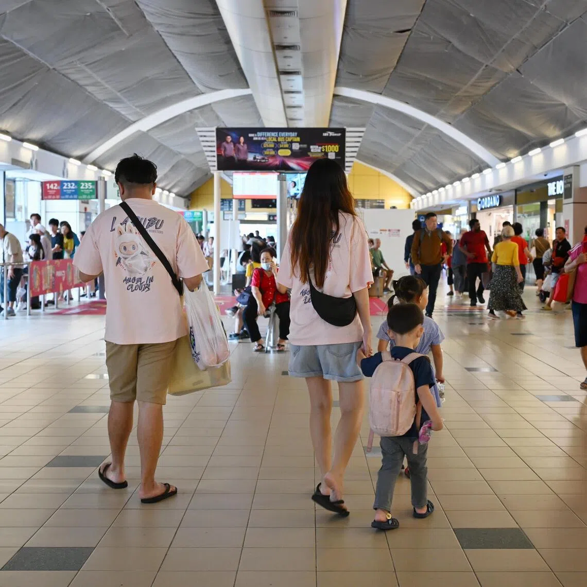 Young parents have a lot on their plate and should not be benchmarked against non-parents, says the writer.