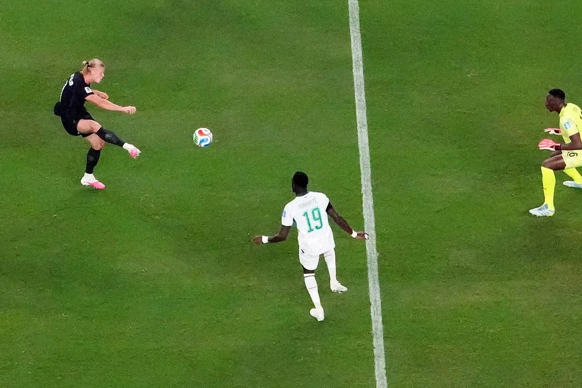 Soccer Football - FIFA World Cup 2026 - Group I - Norway v Senegal - New York/New Jersey Stadium, East Rutherford, New Jersey, U.S. - June 22, 2026 Norway's Erling Haaland scores their third goal past Senegal's Edouard Mendy REUTERS/John Sibley
