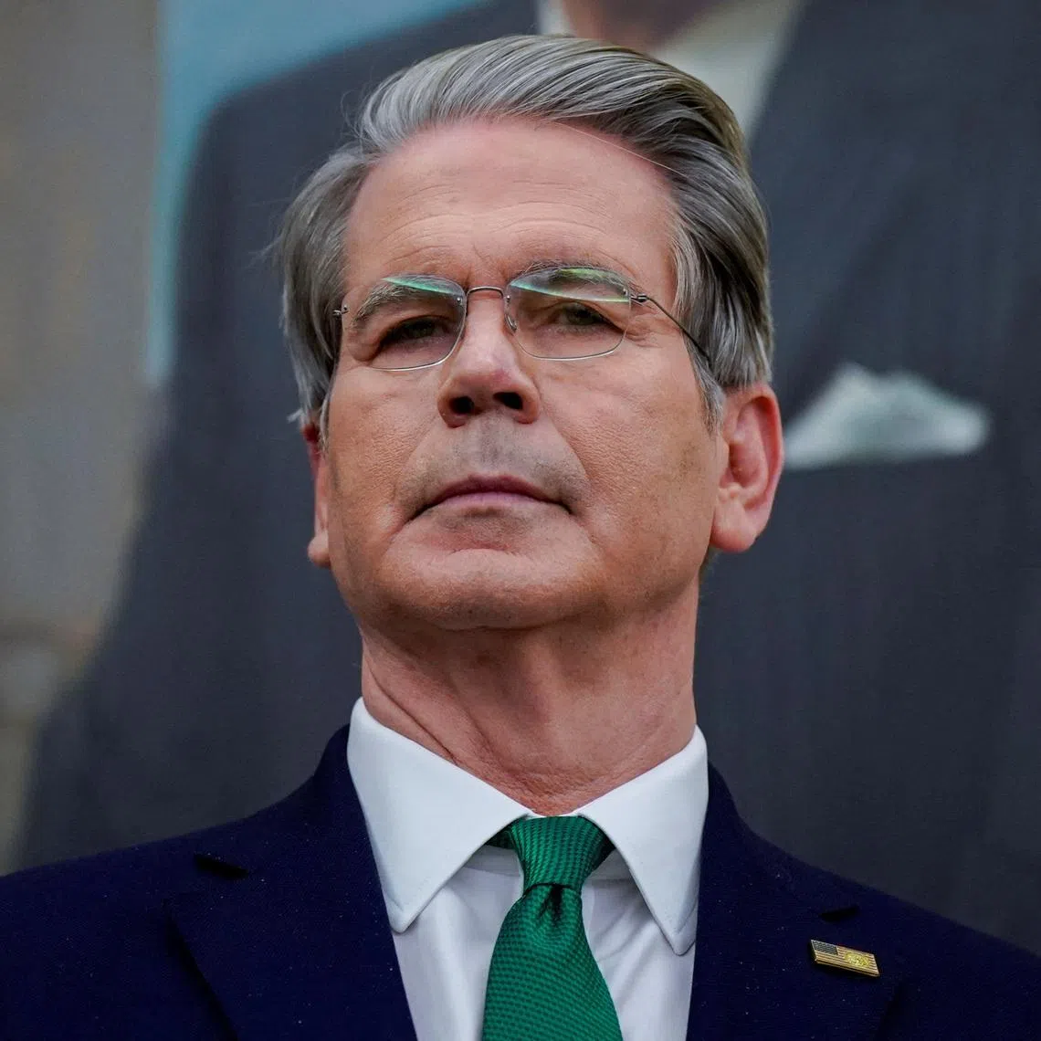 U.S. Treasury Secretary Scott Bessent listens prior to U.S. President Donald Trump (not pictured) signing an executive order on AI in the Oval Office at the White House in Washington, D.C., U.S. December 11, 2025. REUTERS/Al Drago
