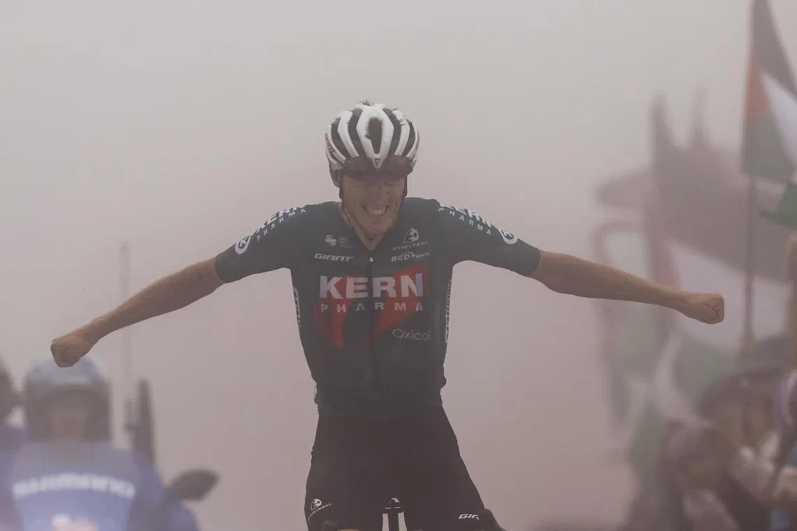 Spanish rider Pablo Castrillo (Kern Pharma) celebrates his victory on the 15th stage of the Vuelta a Espana from Infiesto to Cuitu Negru on Sept 1, 2024.