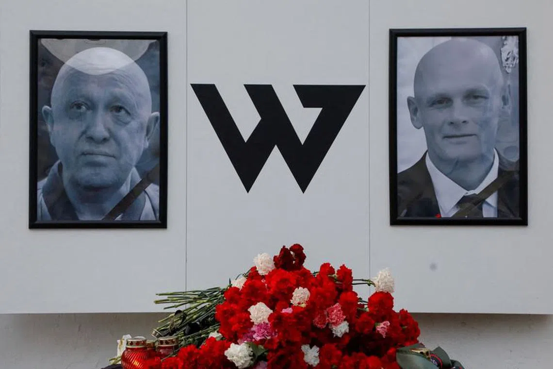 FILE PHOTO: Portraits of Yevgeny Prigozhin, head of the Wagner mercenary group, and Dmitry Utkin, group commander, are seen at a makeshift memorial in Nizhny Novgorod, Russia August 27, 2023.  REUTERS/Anastasia Makarycheva/File Photo