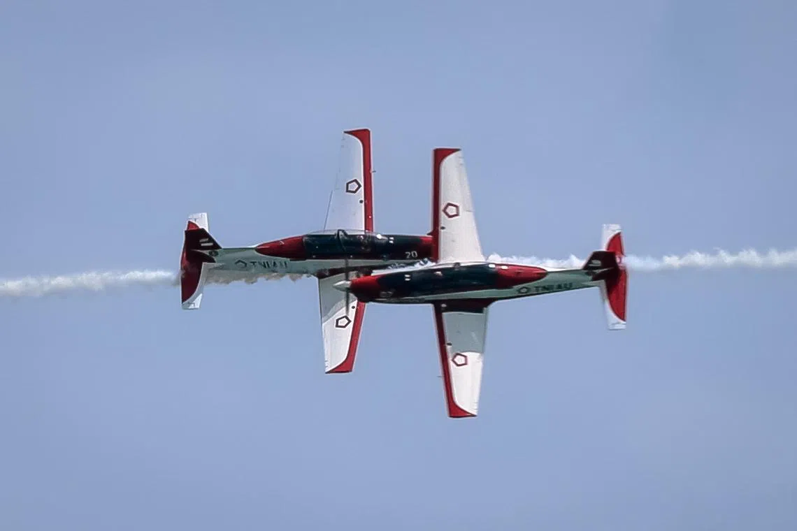 Indonesian Air Force Jupiter Aerobatic Team performing in their KT-1B during an aerial display at the Singapore Airshow held at Changi Exhibition Centre, Feb 25, 2024.