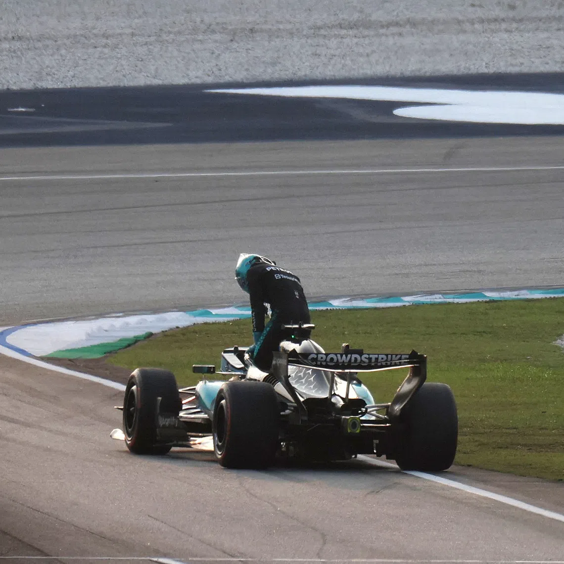 Formula One F1 - Bahrain Grand Prix - Sepang International Circuit, Sepang, Malaysia - October 4, 2026 Mercedes' George Russell after retiring from the race REUTERS/Hasnoor Hussain