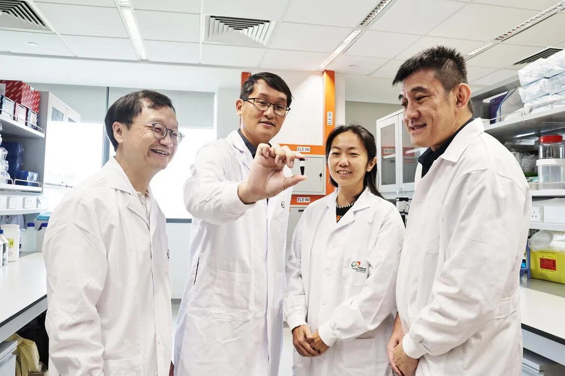 (From left) NUS Medicine Department of Surgery professor Jimmy So, NCCS Department of Sarcoma, Peritoneal and Rare Tumours (SPRinT) head Johnny Ong, SPRinT senior consultant Claramae Chia and SGH Division of Pathology chairman Tony Lim.