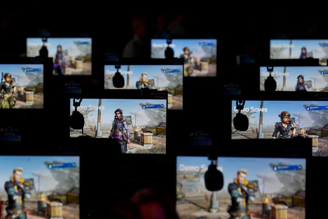 Gaming computers displaying \"Borderlands 3\" by 2K await players at E3, the annual video games expo experience the latest in gaming software and hardware in Los Angeles, California, U.S., June 12, 2019. REUTERS/Mike Blake
