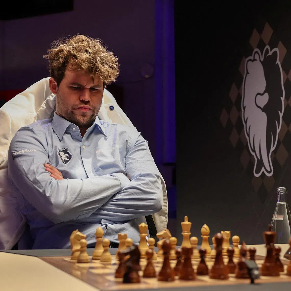 Chess grandmaster Magnus Carlsen reacts ahead of the Freestyle Chess Grand Slam Tour in Paris, France, April 7, 2025. REUTERS/Gonzalo Fuentes