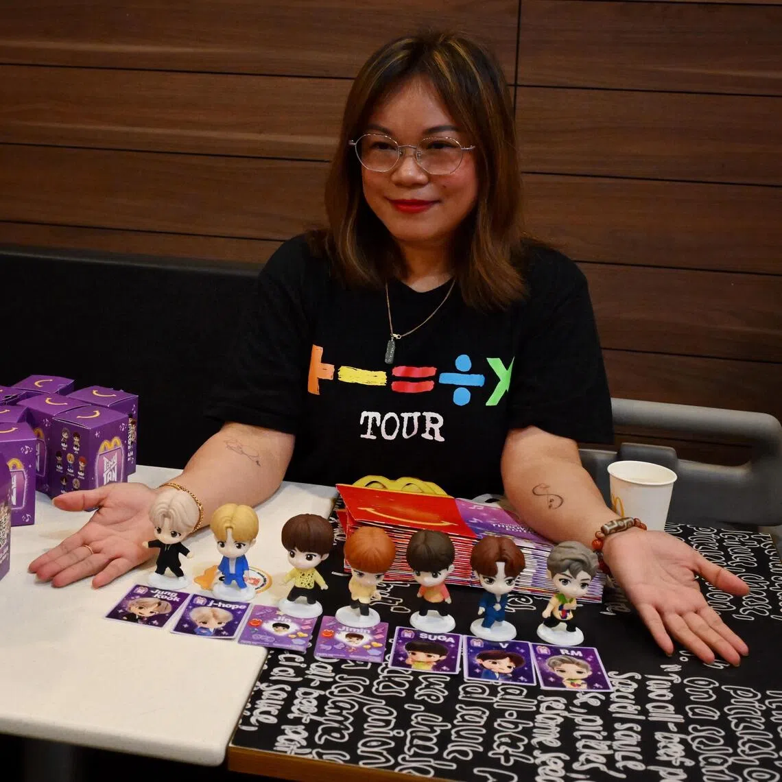 BTS fan Tess Poh bought 14 Happy Meals at a go, and managed to complete her full set.