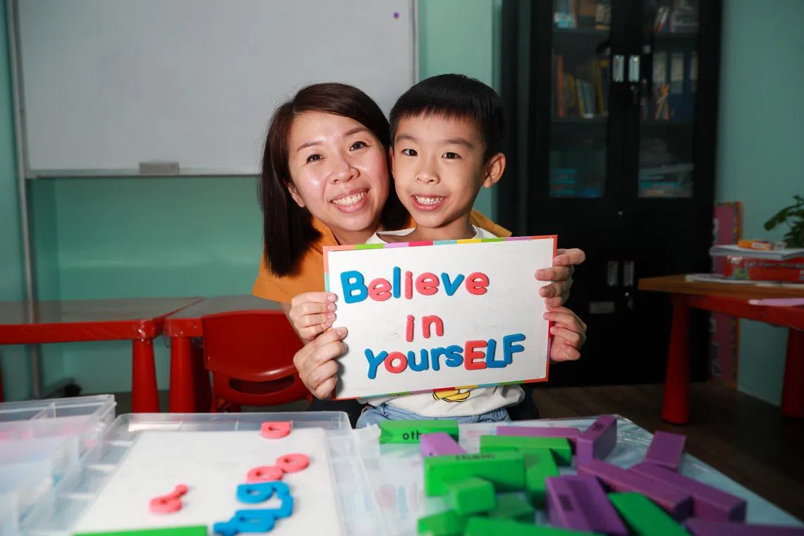 Ms Jenn Kuan (left) enrolled her son, Siew Yu Hong, in Primary 1 preparation classes at Learning Journey Education Centre.