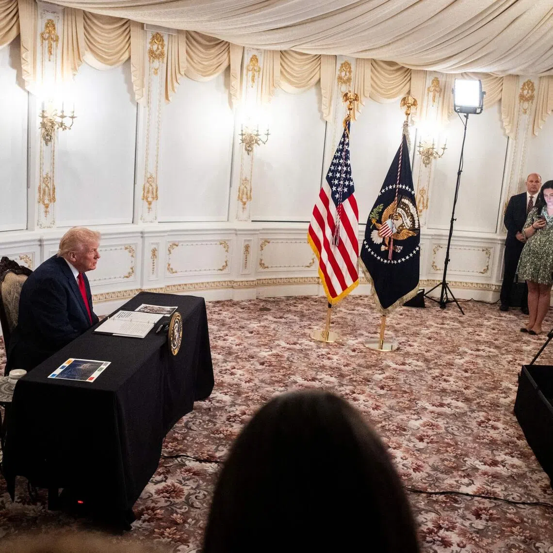 President Donald Trump holds a video call to thank members of the military for their service on Nov 27.