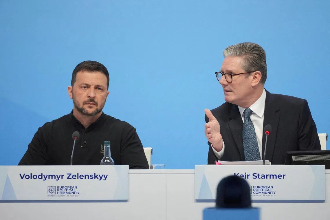 British Prime Minister Keir Starmer gestures as he speaks during the first plenary session, with Ukrainian President Volodymyr Zelenskiy at the European Political Community meeting in Blenheim Palace, Woodstock, Britain, Thursday, July 18, 2024.     Kin Cheung/Pool via REUTERS