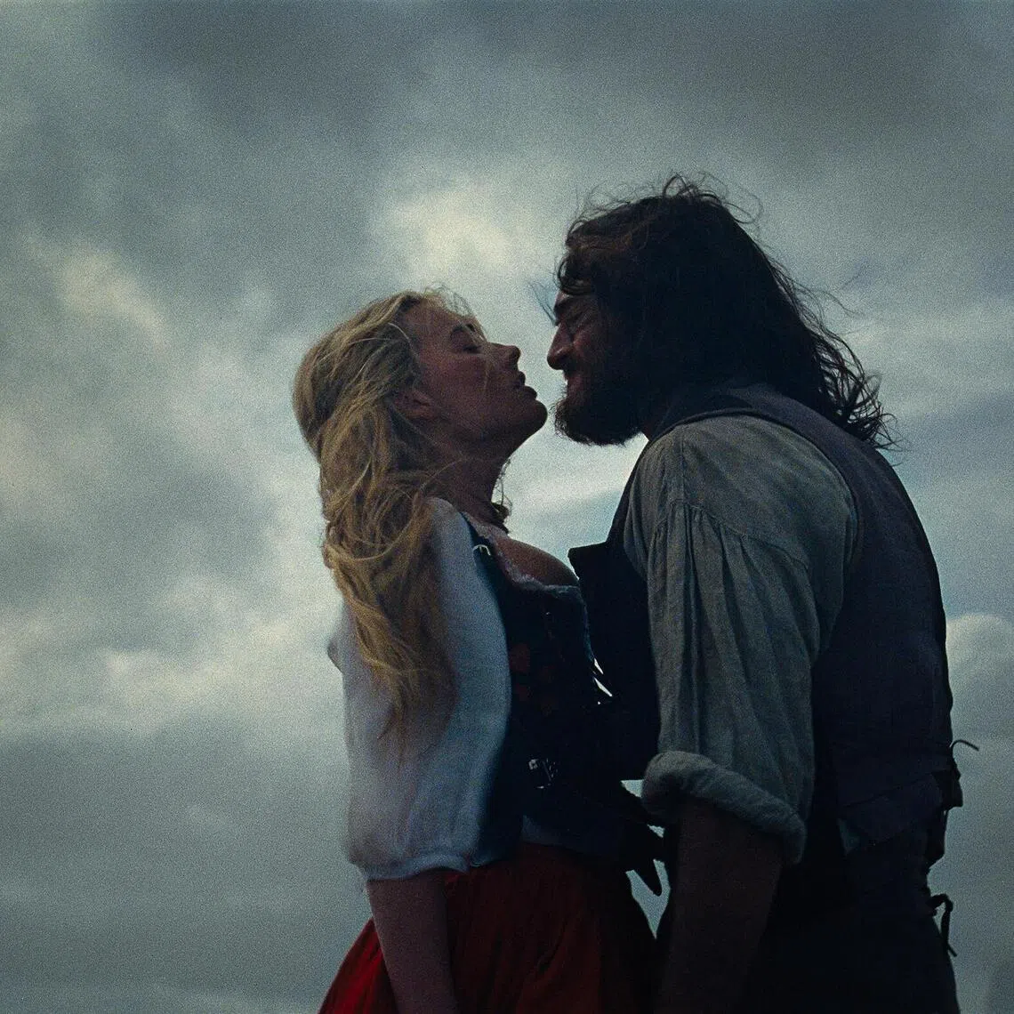 From left: Margot Robbie and Jacob Elordi in Wuthering Heights.