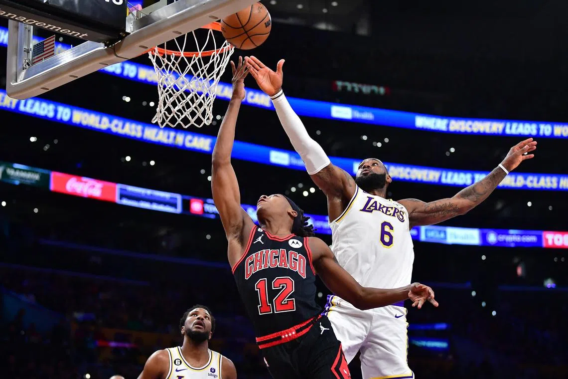 Los Angeles Lakers forward LeBron James blocking the shot of Chicago Bulls guard Ayo Dosunmu. The Bulls won 118-108. 