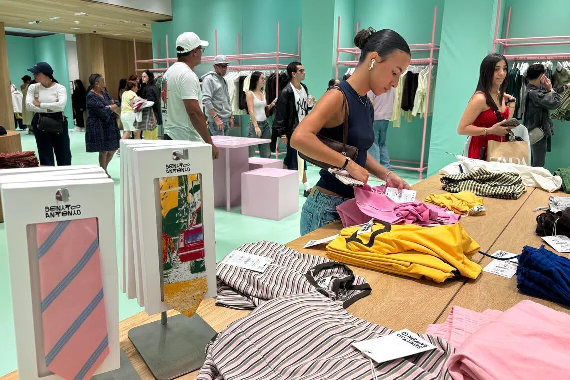 People browse items from the Benito Antonio collection by Puerto Rican singer Bad Bunny at a Zara store in San Juan, Puerto Rico, on May 19, 2026.