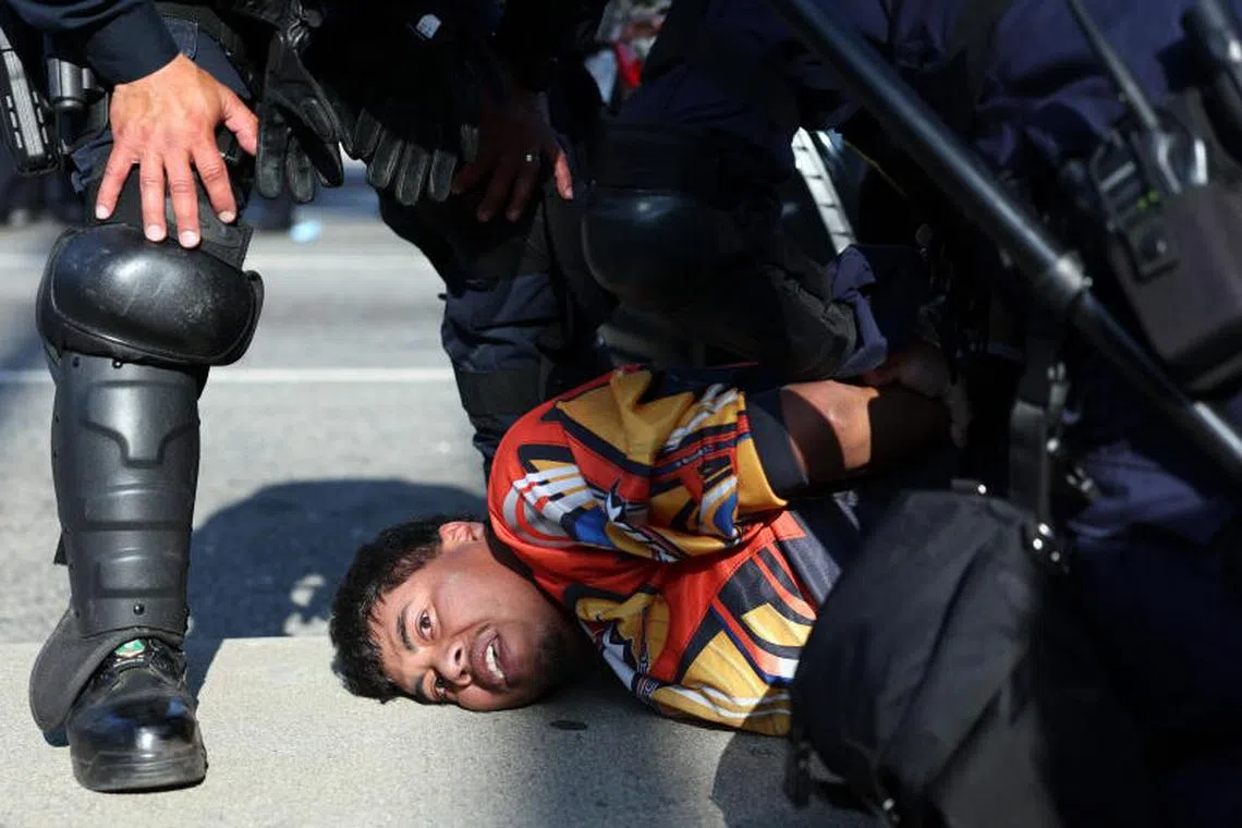 Caption:
epa12217112 (FILE) A protester is arrested during protests sparked by immigration raids in Los Angeles, California, USA, 10 June 2025 (reissued 05 July 2025). ​Since US President Donald Trump took office in January 2025, his administration has launched a mass deportation campaign — the largest in U.S. history — restoring and expanding controversial immigration policies. According to data from US Immigration and Customs Enforcement (ICE) and Syracuse University’s Transactional Records Access Clearinghouse (TRAC), as of 15 June 2025, more than 56,000 immigrants were in ICE detention — the highest number since 2019 — with 71.7 percent of them having no criminal record. The sharp increase in detentions, up from 39,000 in January 2025, particularly of non-criminal migrants, has triggered major protests in cities such as Los Angeles and New York. EPA/ALLISON DINNER