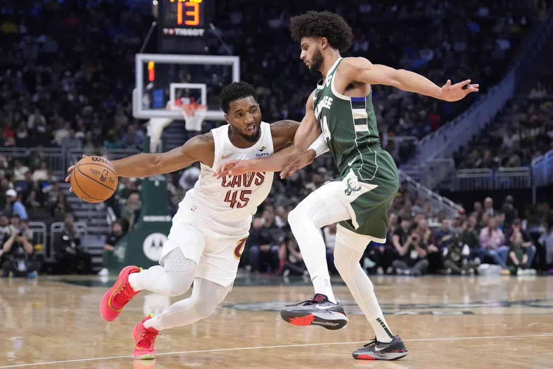 Cleveland Cavaliers guard Donovan Mitchell drives to the basket against Milwaukee Bucks guard Andre Jackson Jr. in the first half at Fiserv Forum. 