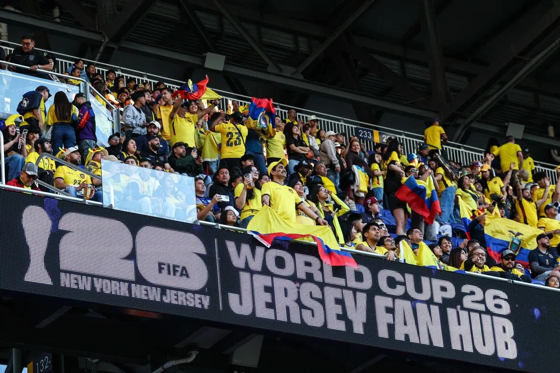 May 30, 2026; Harrison, New Jersey, USA; Fans look from behind a 2026 FIFA New York, New Jersey digital board before an international friendly between Ecuador and Saudi Arabia at Sports Illustrated Stadium. Mandatory Credit: Vincent Carchietta-Imagn Images