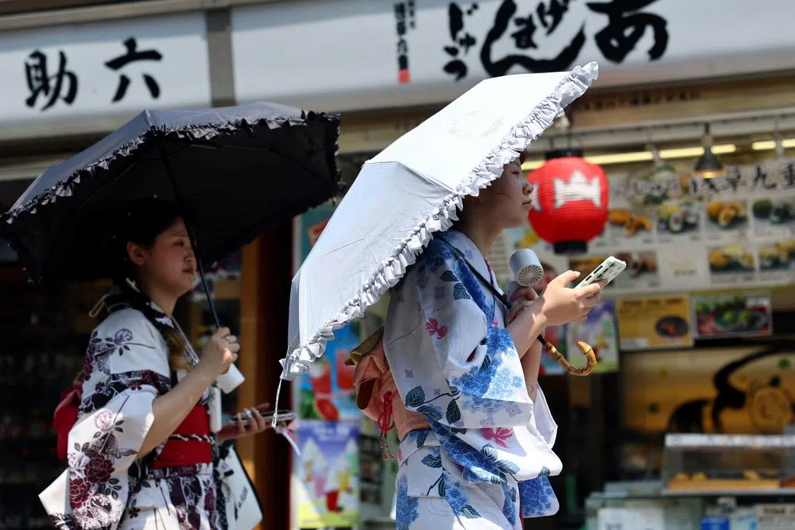 Japan sizzles in first 'brutally hot' days of the year