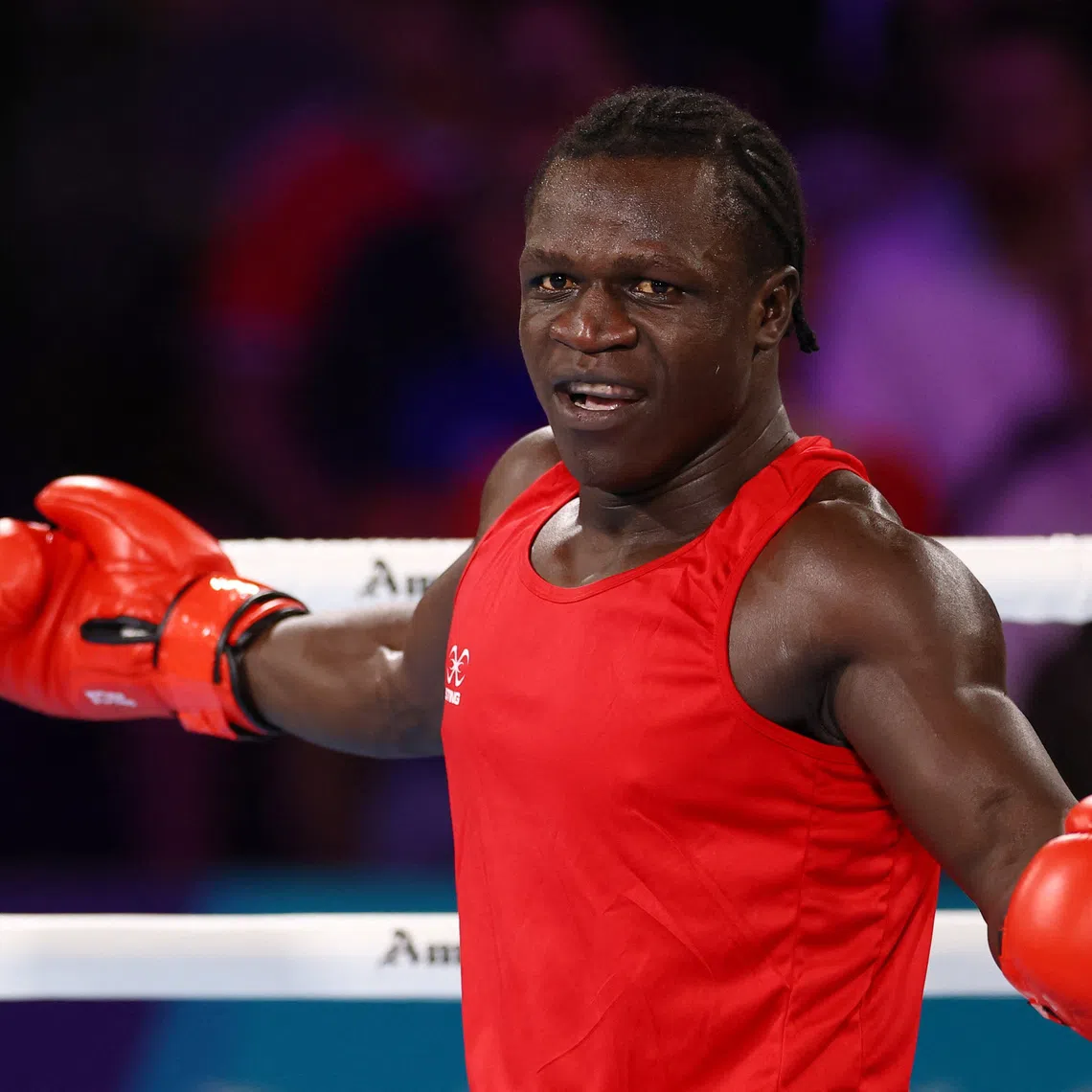 FILE PHOTO: Commonwealth Games 2026 - Boxing - SEC Centre, Glasgow, Scotland, Britain - July 29, 2026  Uganda's Aziz Abdul reacts during the men's 90+kg quarter-final 2 against England's Damar Thomas REUTERS/Matthew Childs/File Photo