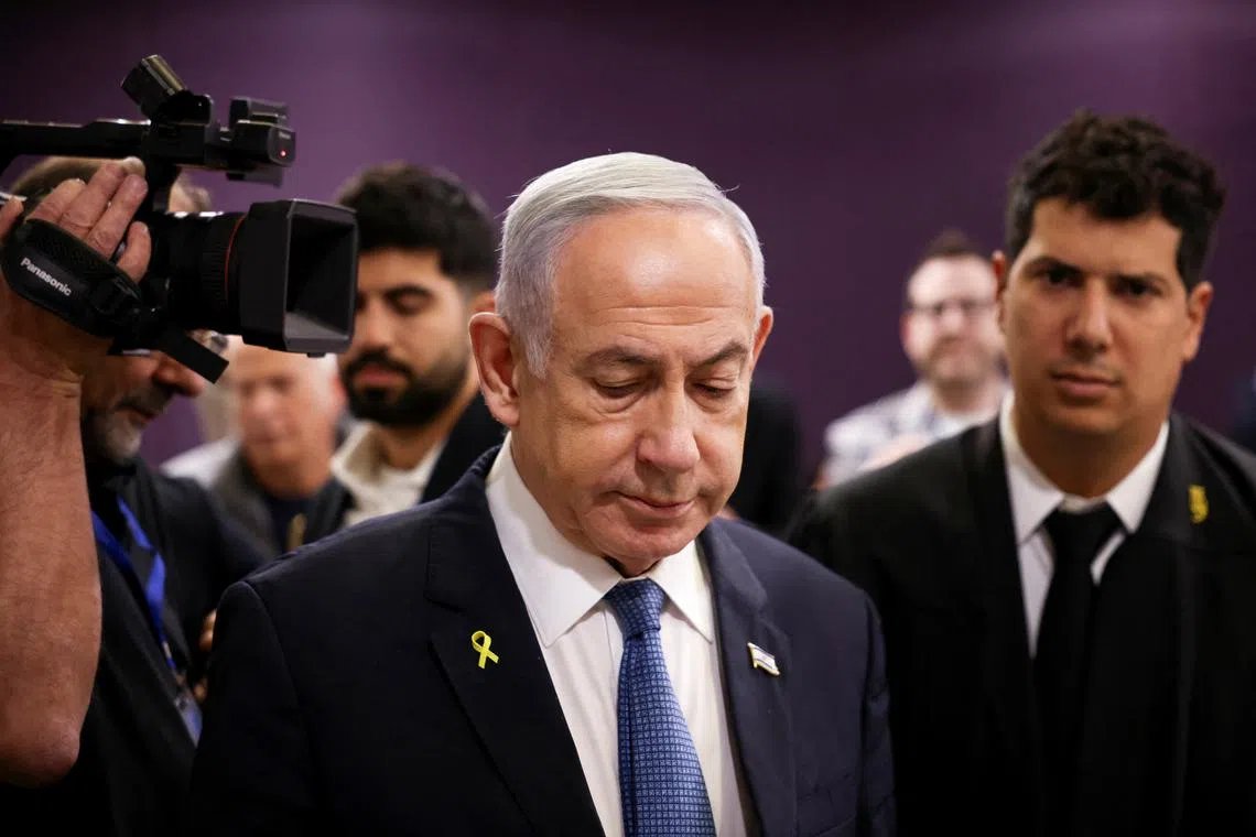 Israeli Prime Minister Benjamin Netanyahu attends his trial on corruption charges at the district court in Tel Aviv, Israel December 16, 2024. REUTERS/Stoyan Nenov/Pool