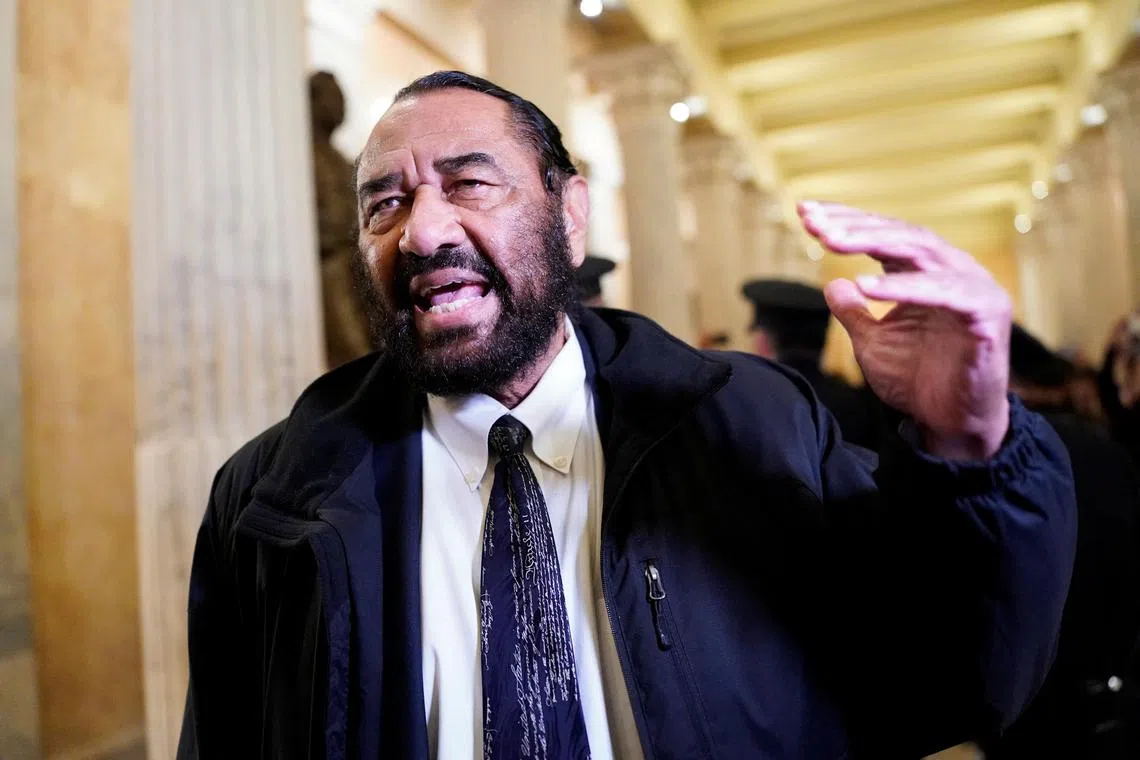 Democratic lawmaker Al Green reacts, after he is escorted out for yelling during US President Donald Trump's speech to a joint session of Congress, at the US Capitol in Washington, DC. 