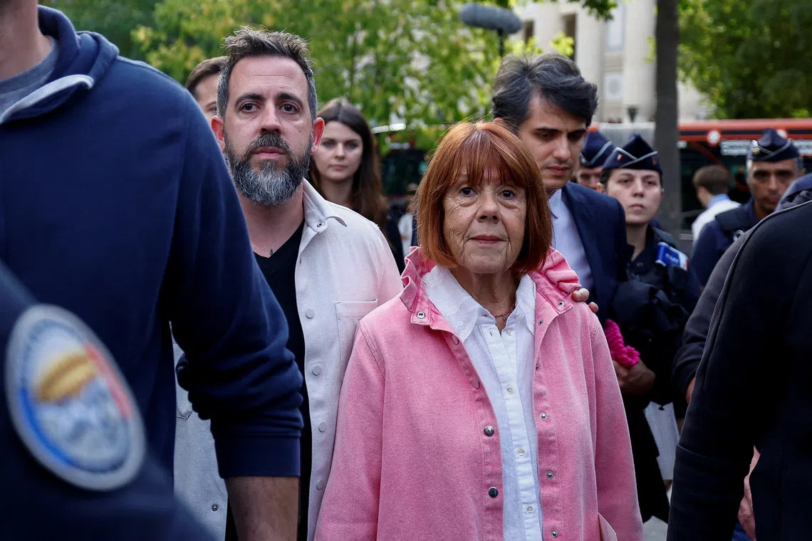 French woman Gisele Pelicot, the victim of a mass rape orchestrated by her then-husband Dominique Pelicot at their home in the southern French town of Mazan, leaves the court with her son Florian Pelicot, after the verdict, on the day of a courthouse hearing during the fourth and final day of the appeal trial filed by Husamettin D., one of the 51 people convicted in her rape trial, in Nimes, France, October 9, 2025. REUTERS/Manon Cruz