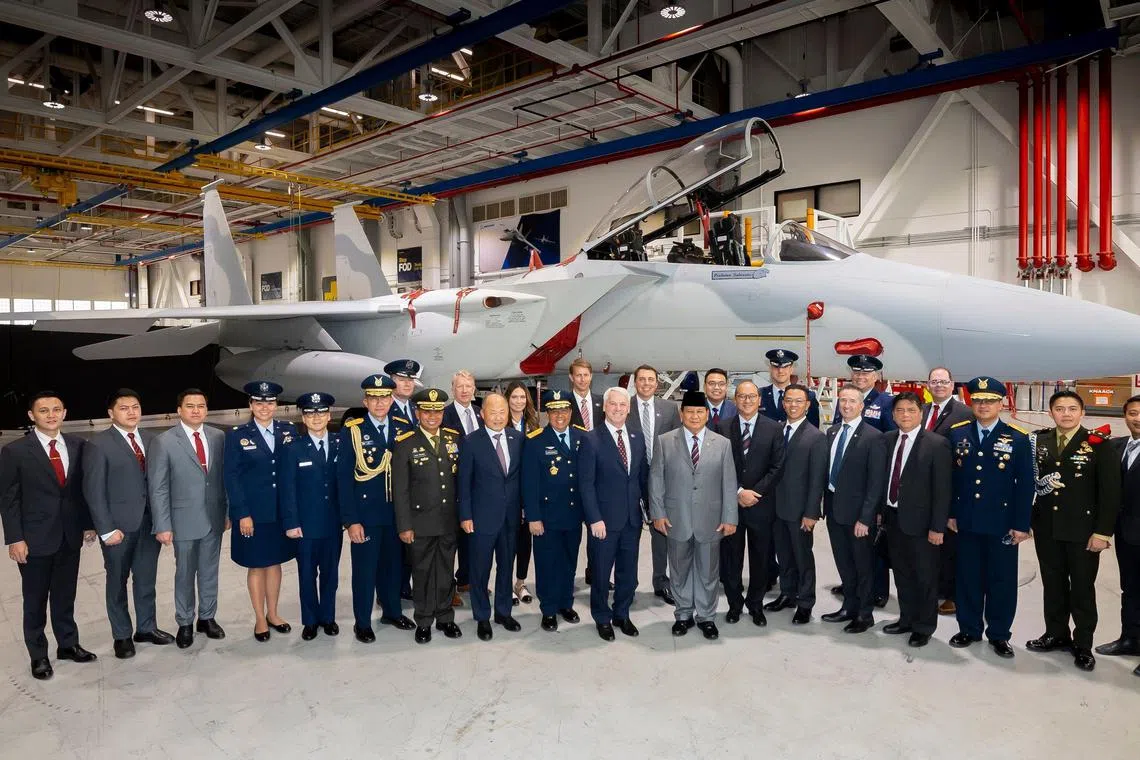 Indonesian Defence Minister Prabowo Subianto (foreground, eighth from right) at Boeing's St Louis facility on Aug 21.