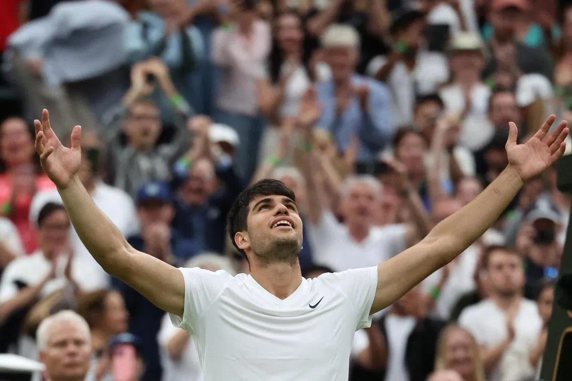 Spain's Carlos Alcaraz celebrating after winning his Wimbledon third-round match against Frances Tiafoe of the United States 5-7, 6-2, 4-6, 7-6 (7-2), 6-2 on July 5.