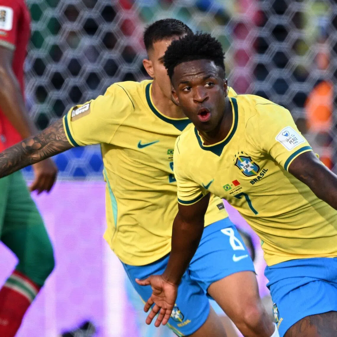 Brazil's forward Vinicius Junior celebrates scoring his team's first goal during the 2026 World Cup Group C football match between Brazil and Morocco at the New York/New Jersey Stadium.