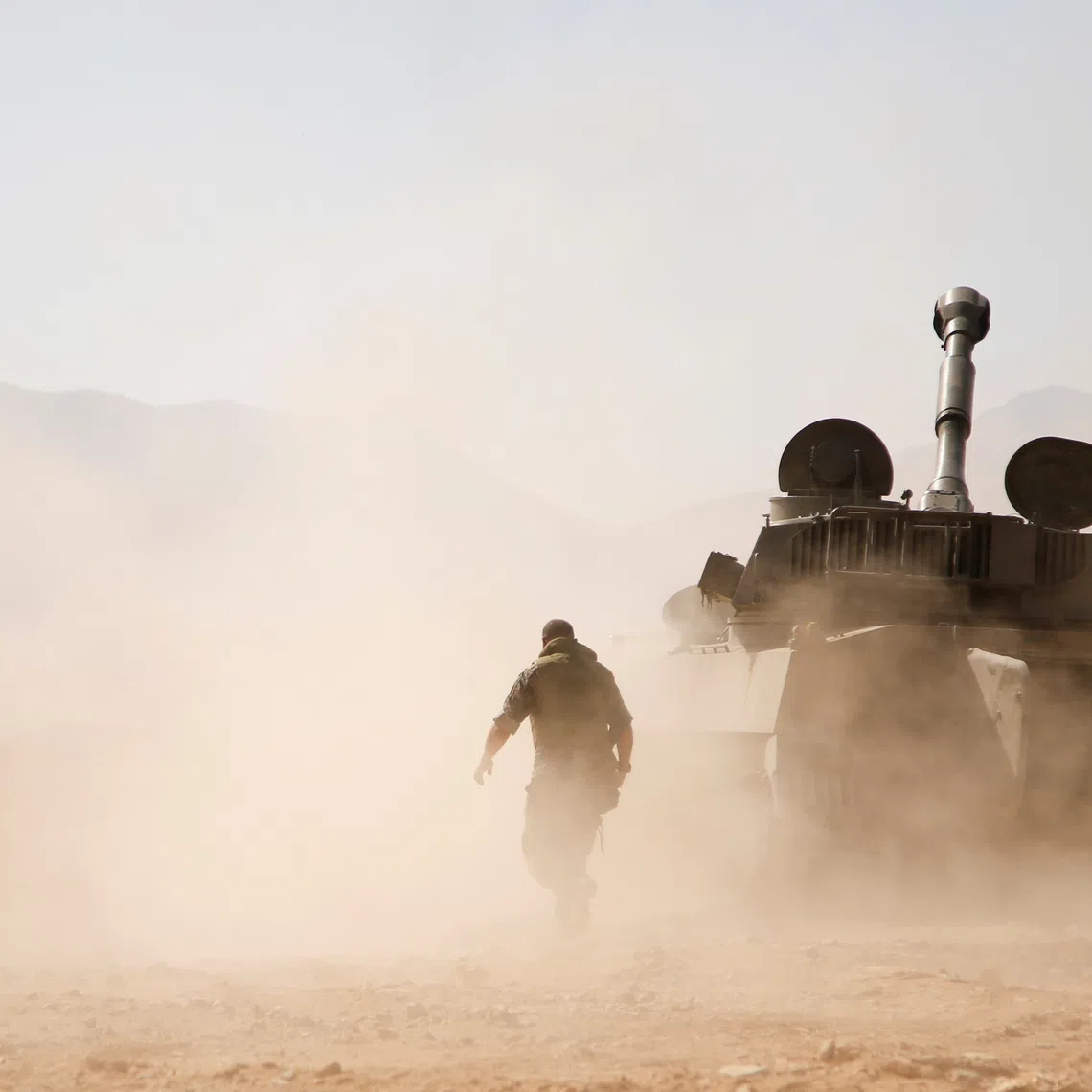 A Hezbollah fighter beside a military tank in Western Qalamoun, Syria, in 2017. Washington has long sought to reduce Iran’s influence in countries in the Middle East.