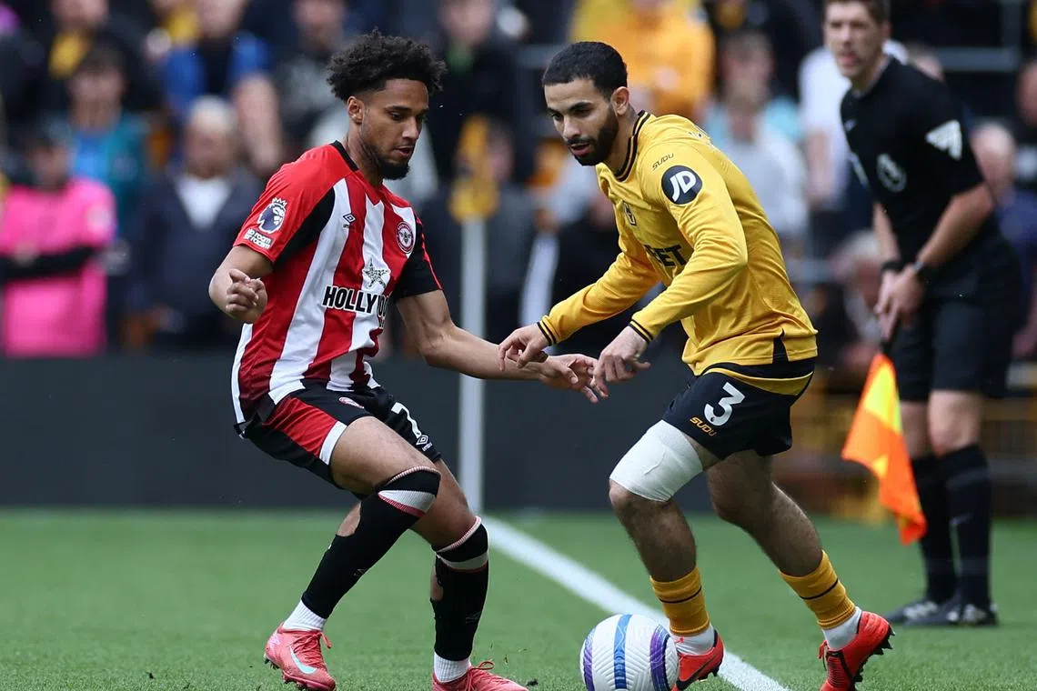 FILE PHOTO: Soccer Football - Premier League - Wolverhampton Wanderers v Brentford - Molineux Stadium, Wolverhampton, Britain - May 25, 2025 Wolverhampton Wanderers' Rayan Ait-Nouri in action with Brentford's Kevin Schade REUTERS/Isabel Infantes/File Photo