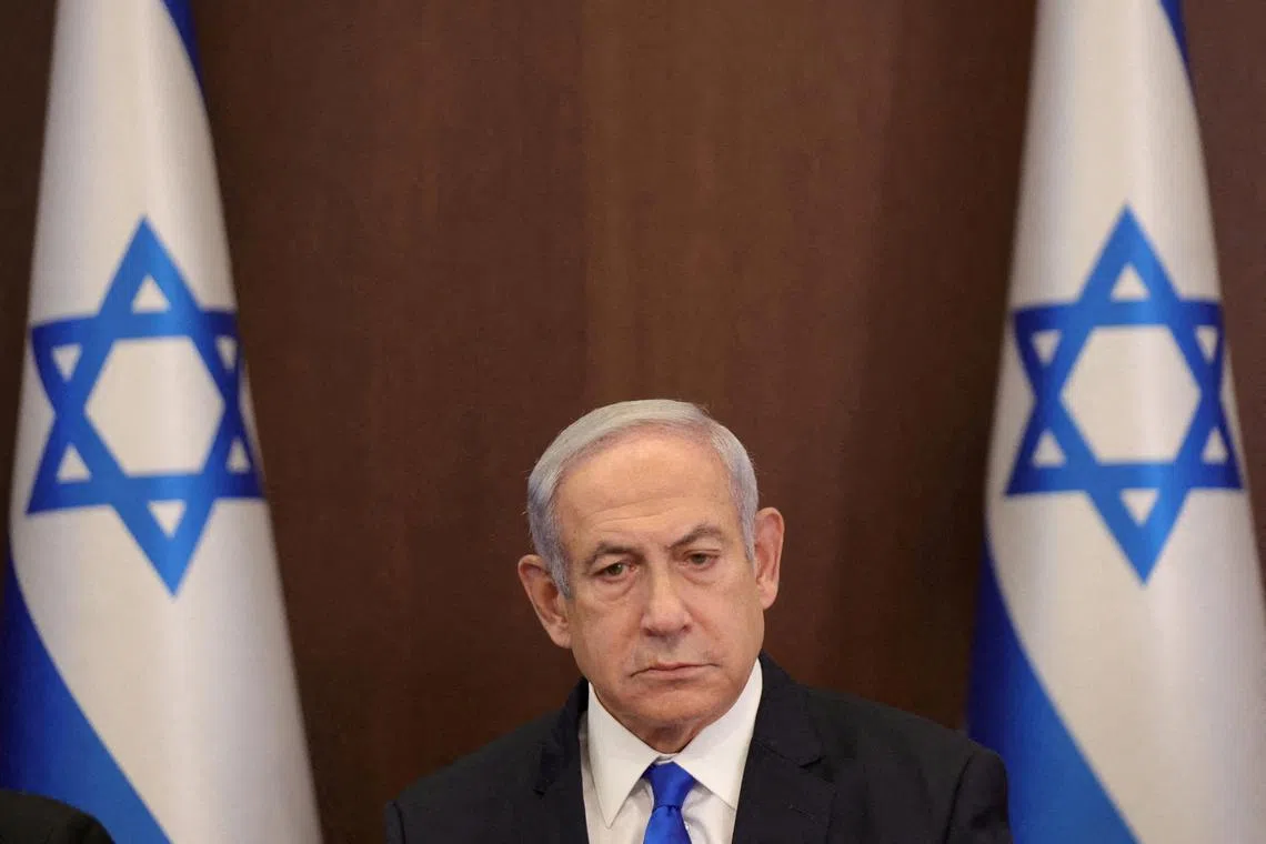FILE PHOTO: Israeli Prime Minister Benjamin Netanyahu attends the weekly cabinet meeting at the prime minister's office in Jerusalem, 25 June 2023. ABIR SULTAN/Pool via REUTERS/File Photo