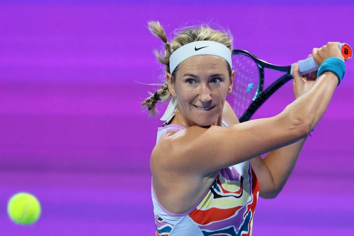 Victoria Azarenka returns the ball to Ipek Oz during their match at the Qatar Open.