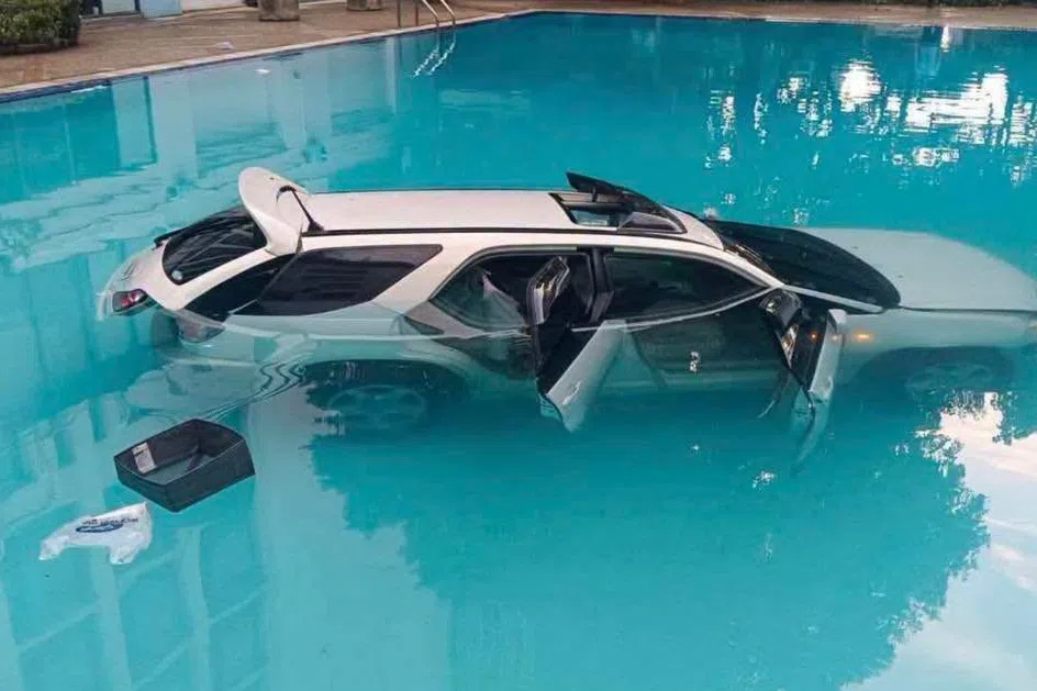 Row over $1,000 condo rent: Man drives SUV into Thai university pool to spite mum