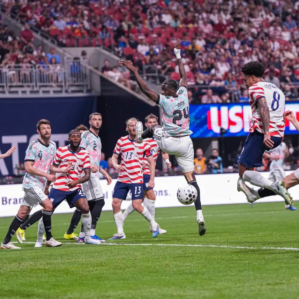Mar 28, 2026; Atlanta, Georgia, USA; USA's Weston McKennie (8) scores a goal against Belgium during the first half at Mercedes-Benz Stadium. Mandatory Credit: Dale Zanine-Imagn Images