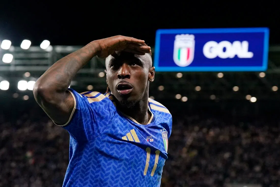 Italy's Moise Kean celebrates scoring their second goal.