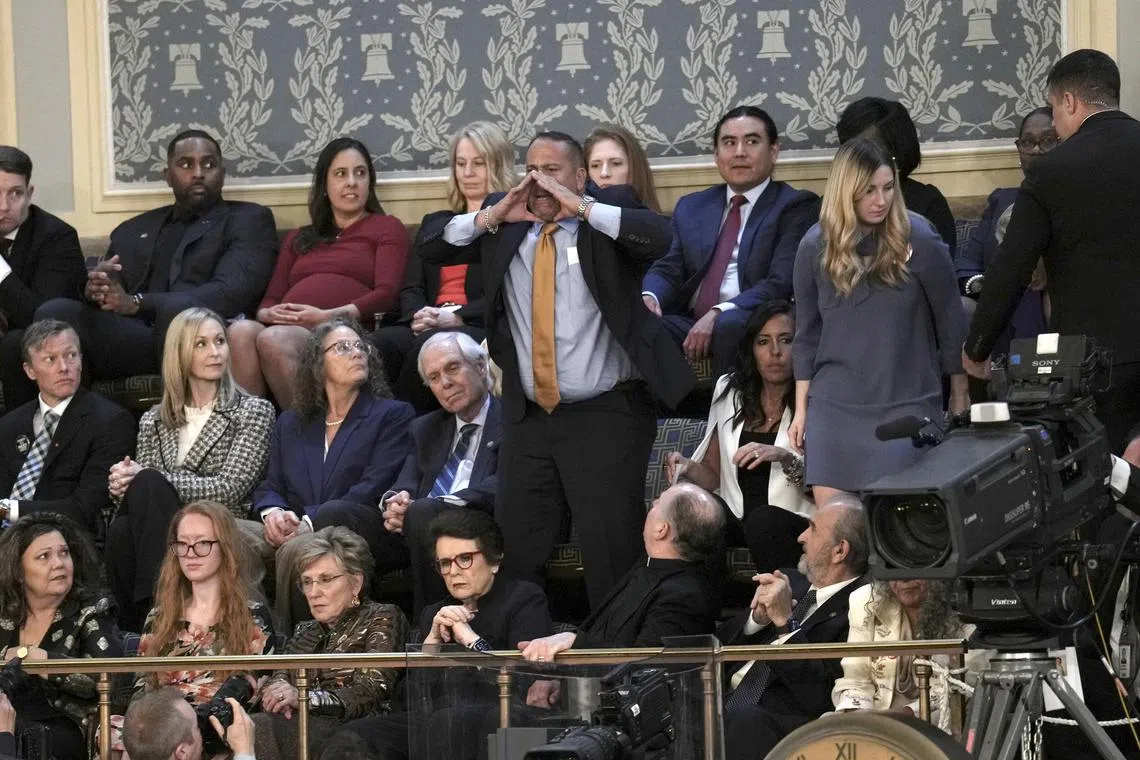 Mr Steve Nikoui, the father of a US Marine killed in Afghanistan, interrupts President Joe Biden's State of the Union address.