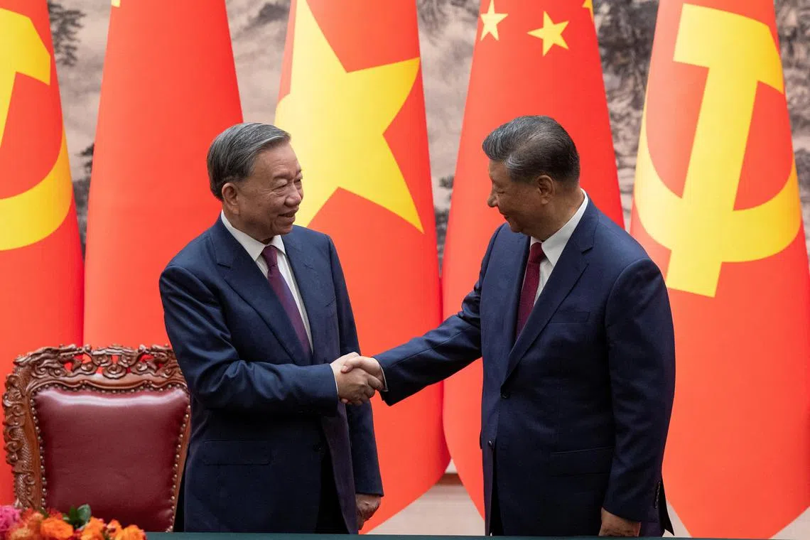Chinese President Xi Jinping and Vietnam's President To Lam shake hands after a signing ceremony at the Great Hall of the People in Beijing, China, 19 August 2024. ANDRES MARTINEZ CASARES/Pool via REUTERS
