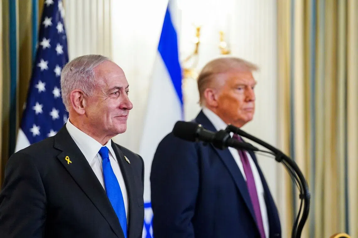 US President Donald Trump (right) and Israel's prime minister Benjamin Netanyahu during a news conference in the White House in Washington, DC, on Sept 29.