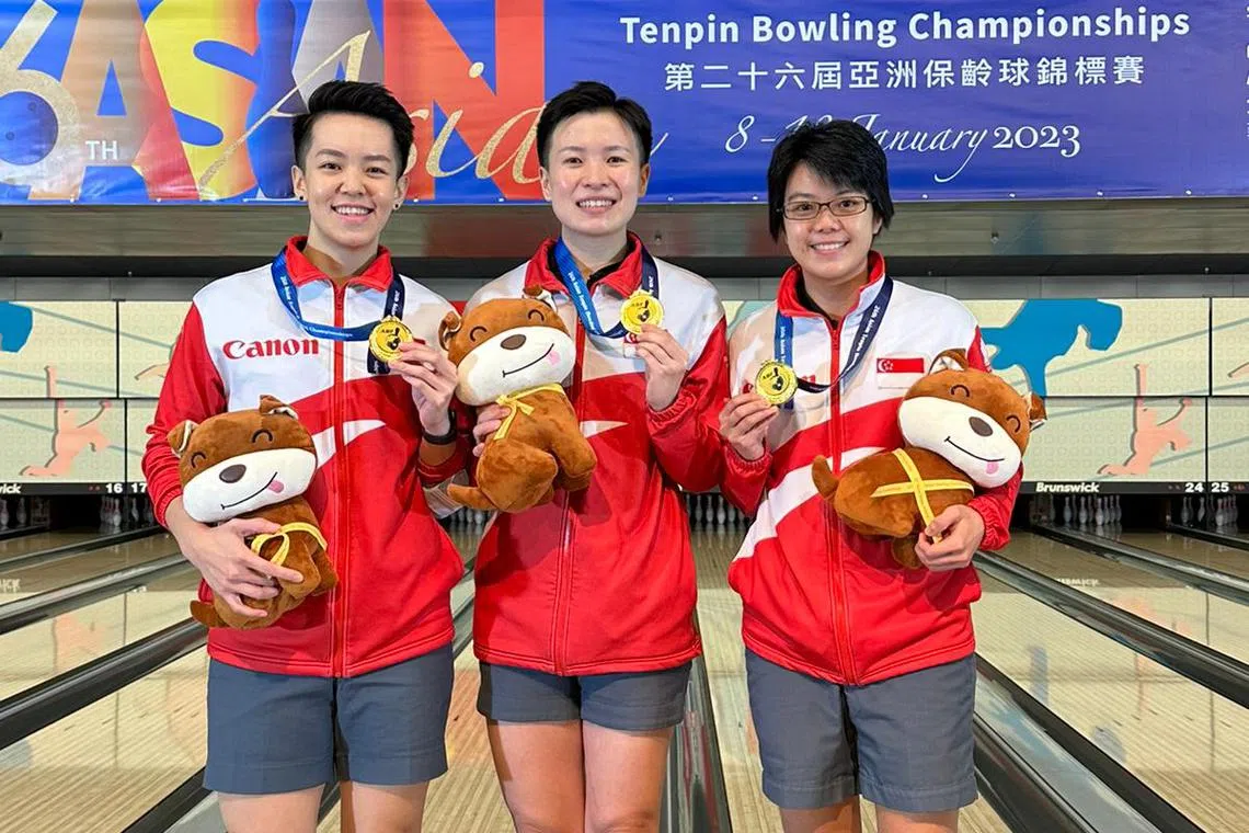 (From left) Shayna Ng, New Hui Fen and Cherie Tan posing with their gold medals after winning the women's trios event at the 26th Asian Tenpin Bowling Championships in Hong Kong.