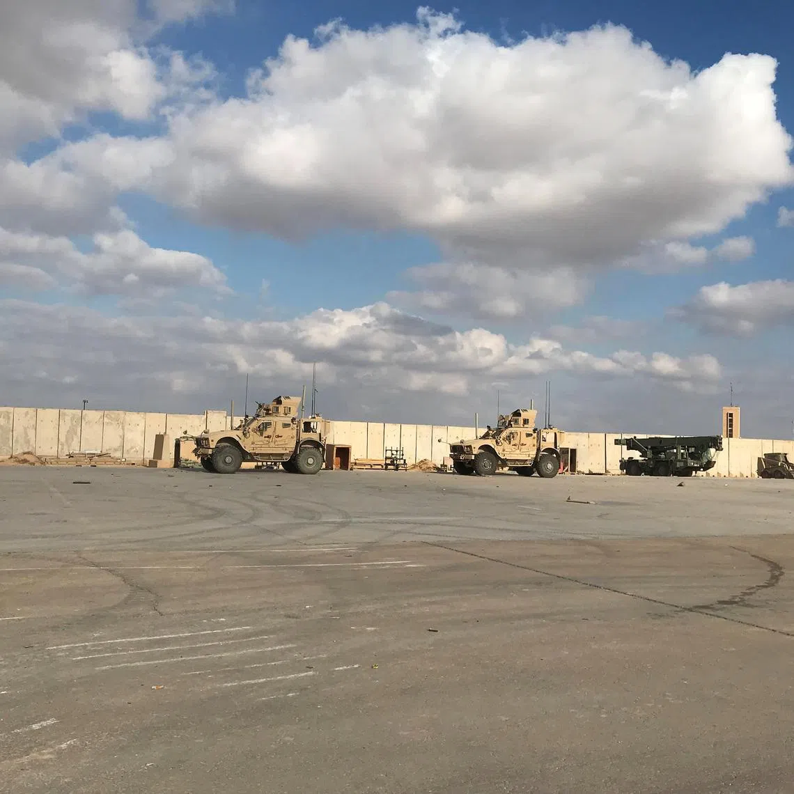 Military vehicles of U.S. soldiers are seen at Ain al-Asad air base in Anbar province, Iraq January 13, 2020. REUTERS/John Davison